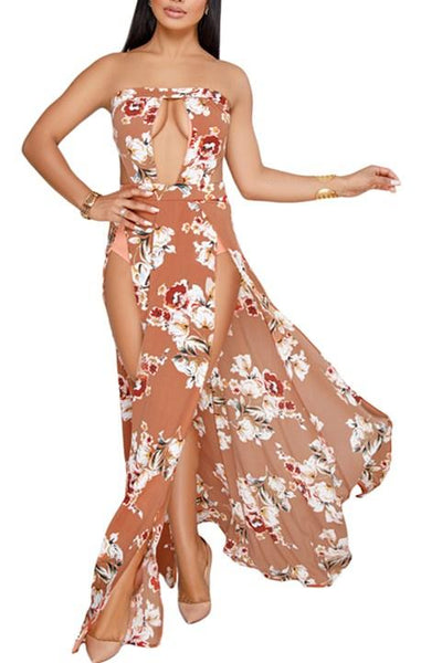 Orange floral cutout strapless jumpsuit with slit legs, sleeveless design, and flowing style.